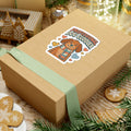Professional Dog Cuddler sticker on a kraft gift box tied with a sage green ribbon, styled with gingerbread cookies, pine sprigs and fairy lights