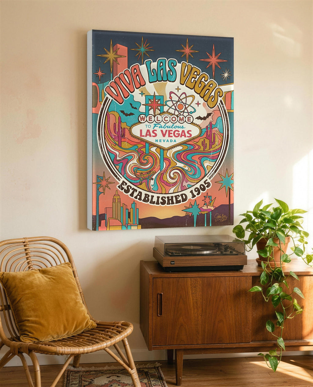 Viva Las Vegas retro canvas above a walnut sideboard with record player