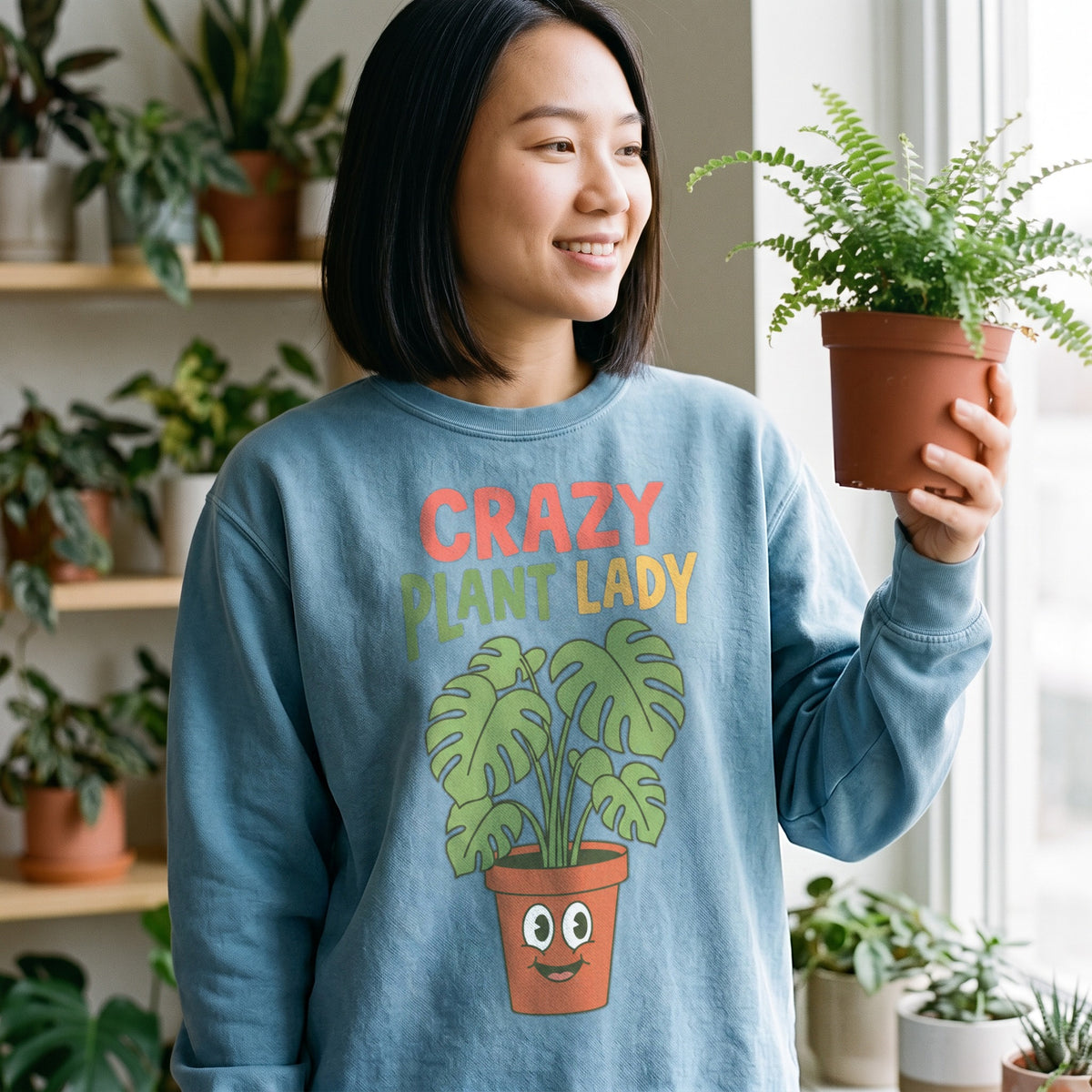 Crazy Plant Lady Crewneck Sweatshirt in ocean, worn by an approved model, close lifestyle photograph