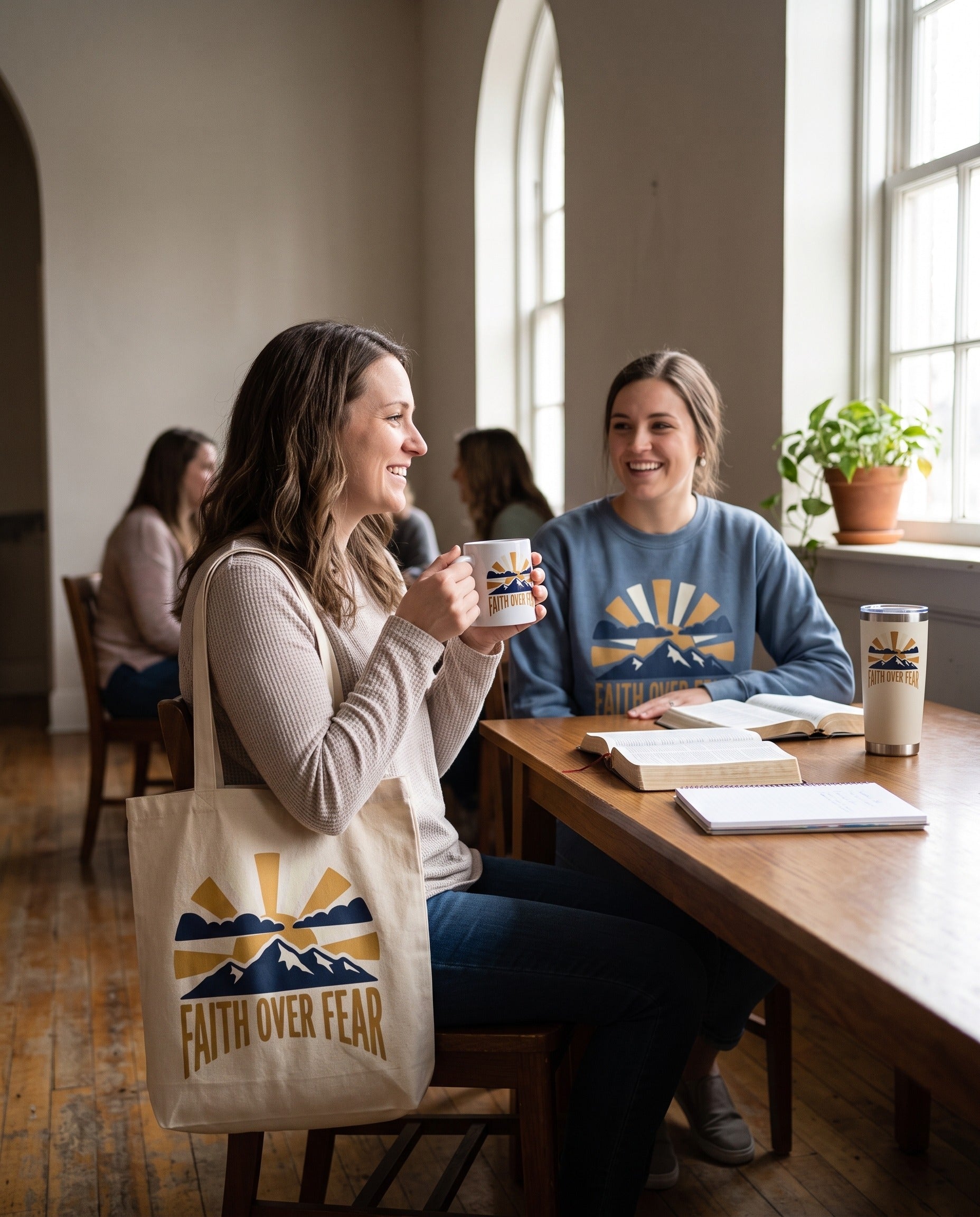 Faith Over Fear mug, crewneck, tote and tumbler in a hall after a study group