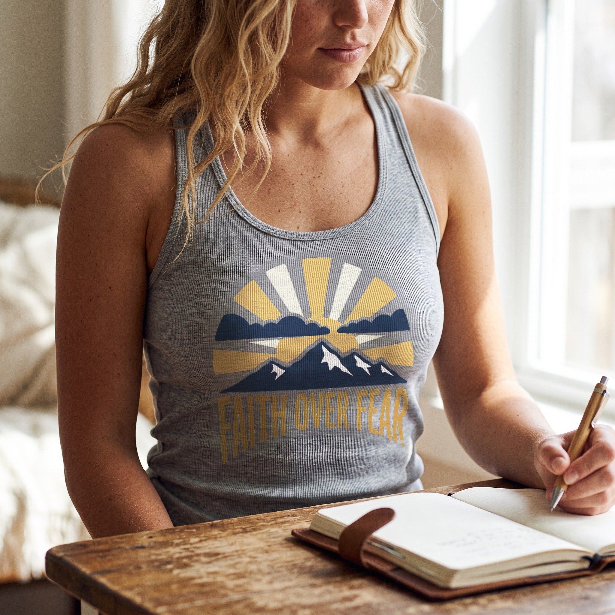 Faith Over Fear Tank Top in heather grey, worn by an approved model, close lifestyle photograph