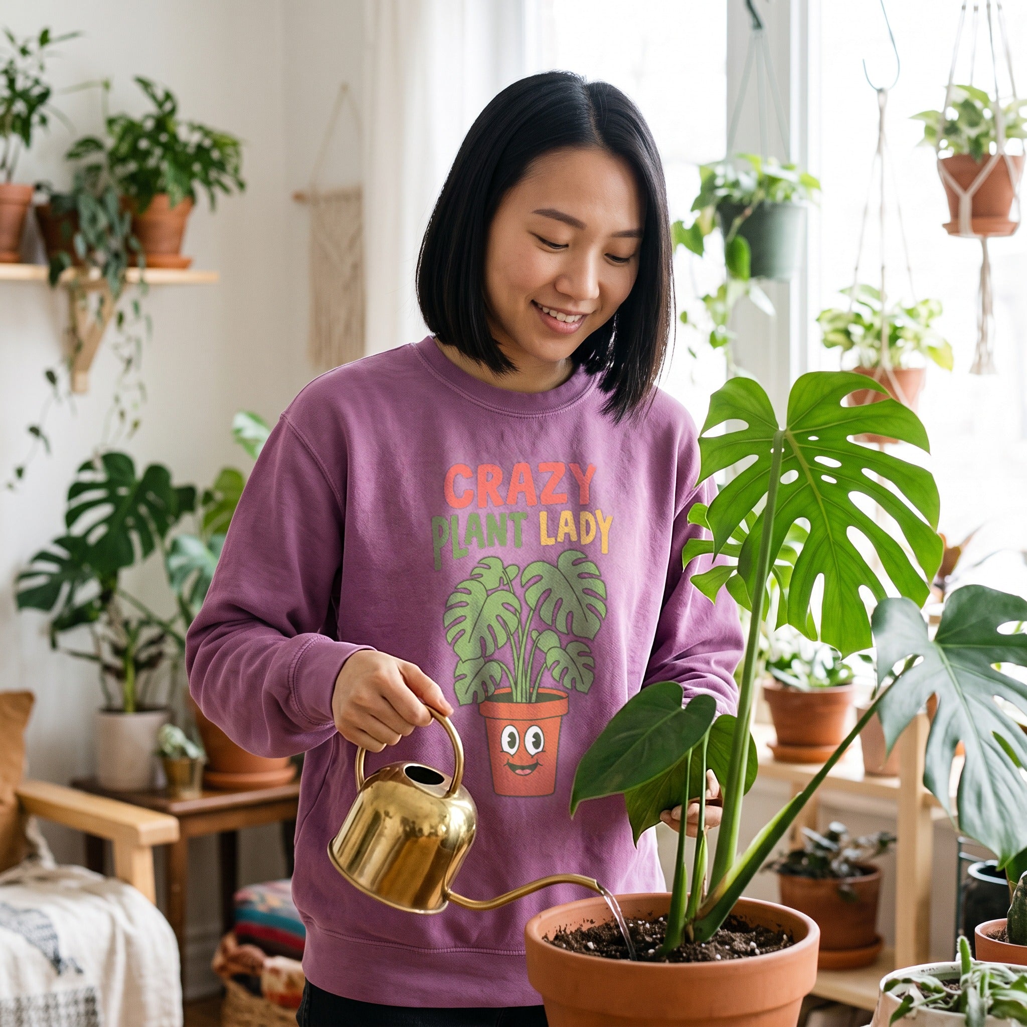 Crazy Plant Lady Crewneck Sweatshirt in amethyst, worn by an approved model, wide lifestyle photograph