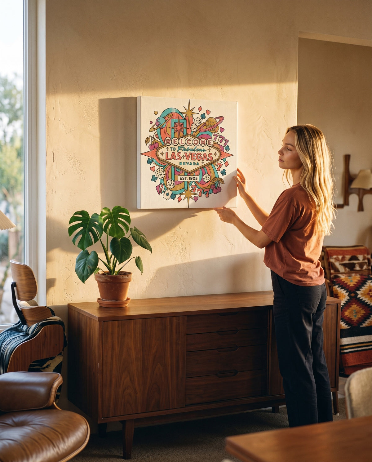 Retro Las Vegas canvas, 18 by 24 inches, above a walnut credenza in a mid-century living room