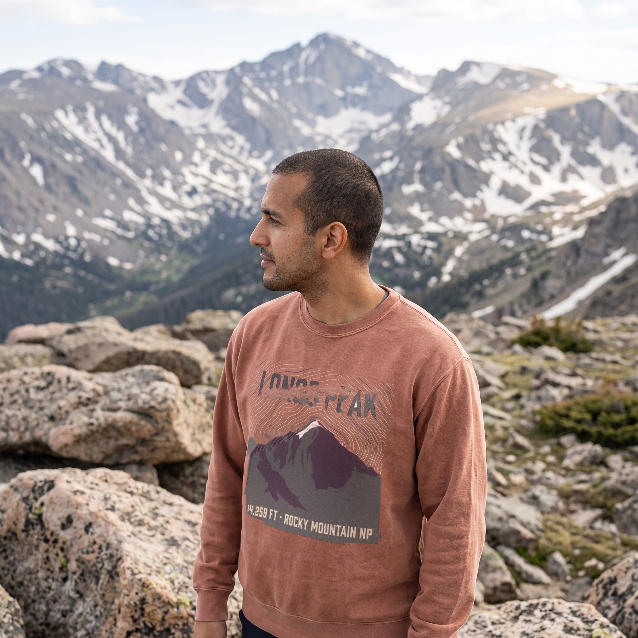 Longs Peak crewneck sweatshirt in clay, worn by an approved model, wide lifestyle photograph
