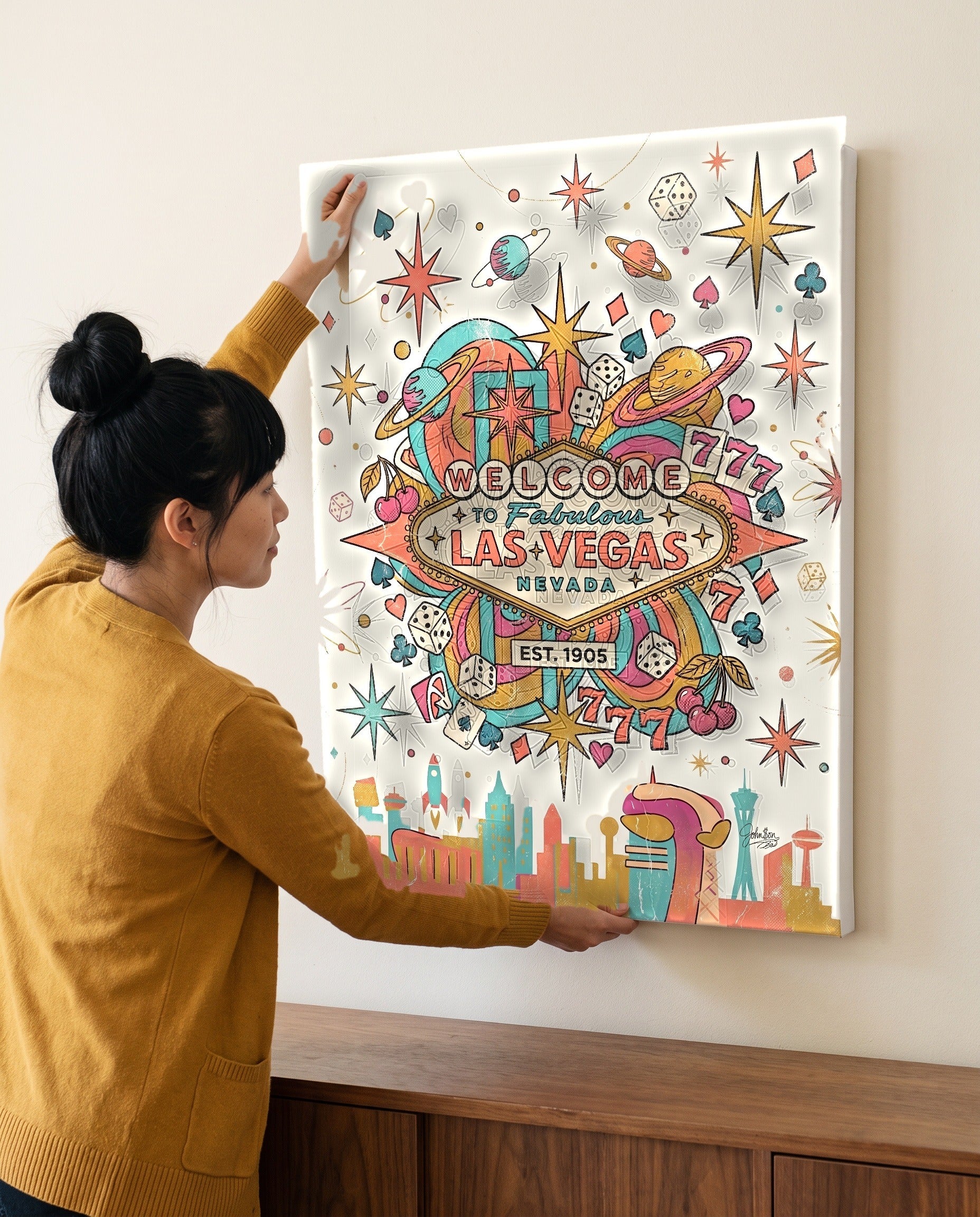Woman leveling the retro casino canvas, showing its true 18 by 24 inch size