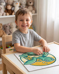 Child completing the sea turtle sunset badge 30 piece kids puzzle at a play table