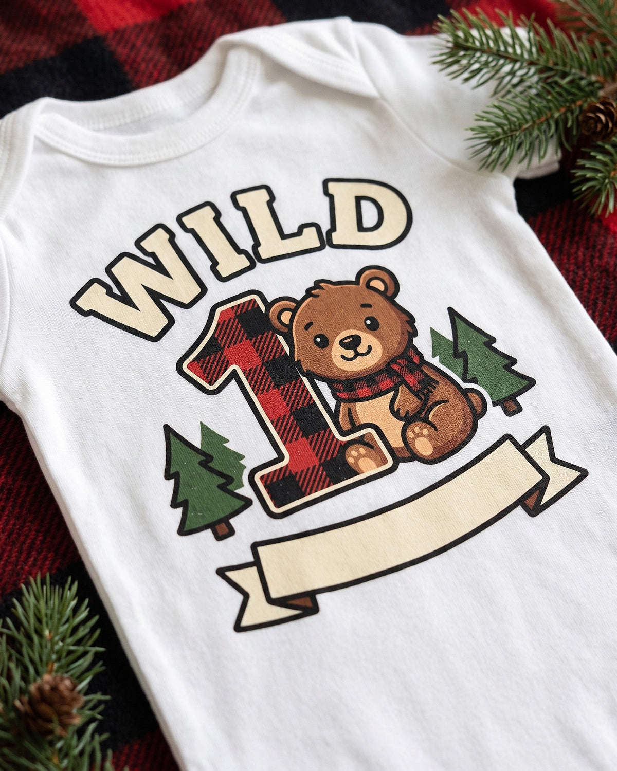 Close up of the Wild One plaid bear first birthday print showing soft matte ink on cotton weave