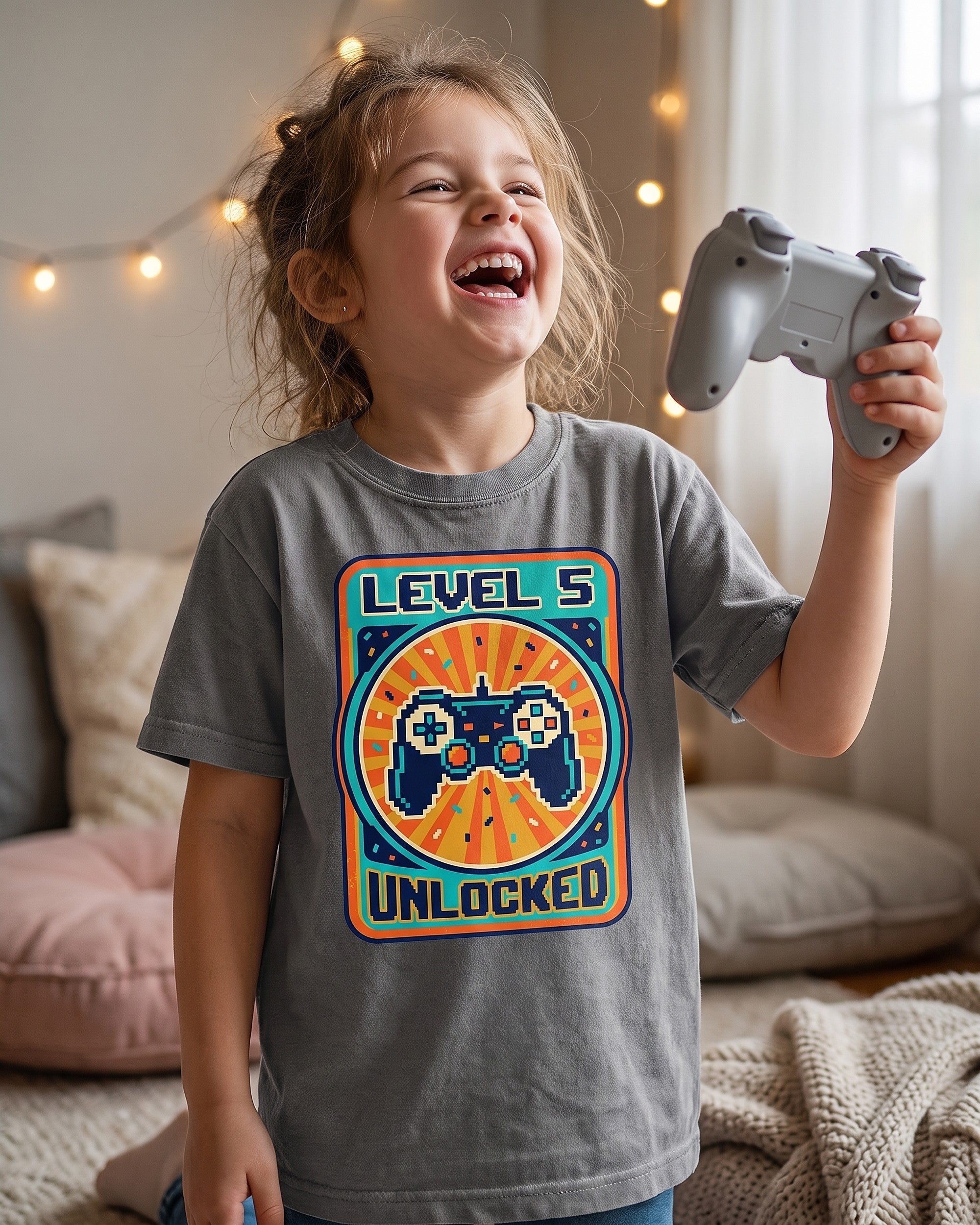 Level 5 Unlocked arcade 5th birthday design worn by a smiling child outdoors