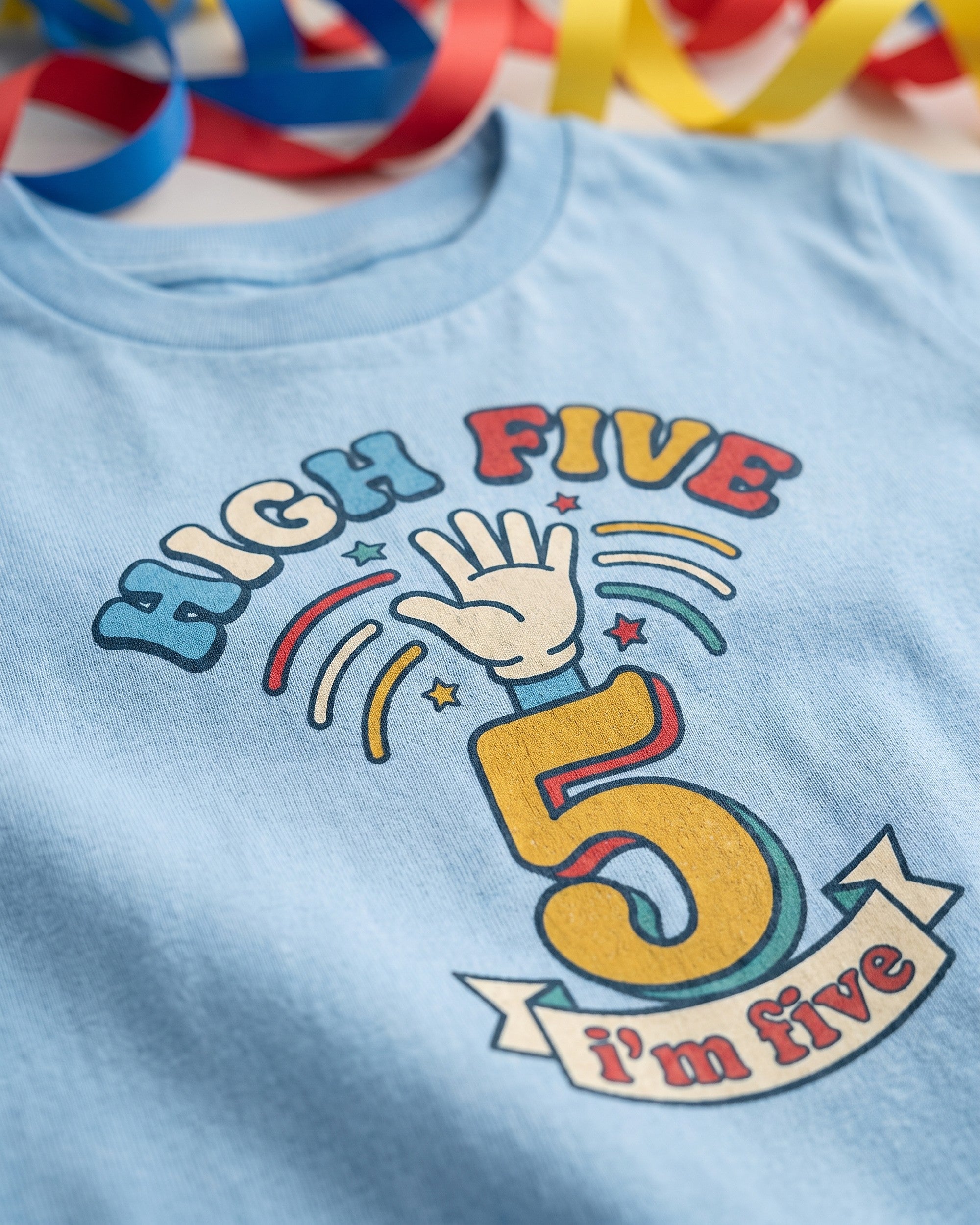 Close up of the High Five 5th birthday print showing soft matte ink on cotton weave