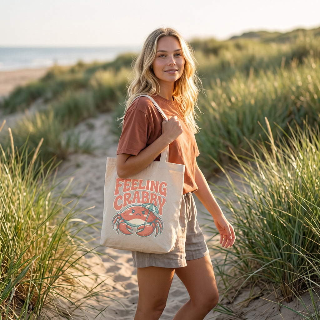 Feeling Crabby Canvas Tote Bag in natural, worn by an approved model, mid lifestyle photograph
