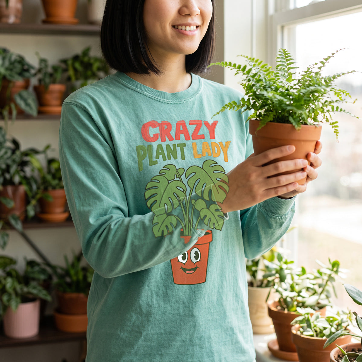 Crazy Plant Lady long sleeve tee in seafoam, worn by an approved model, close lifestyle photograph
