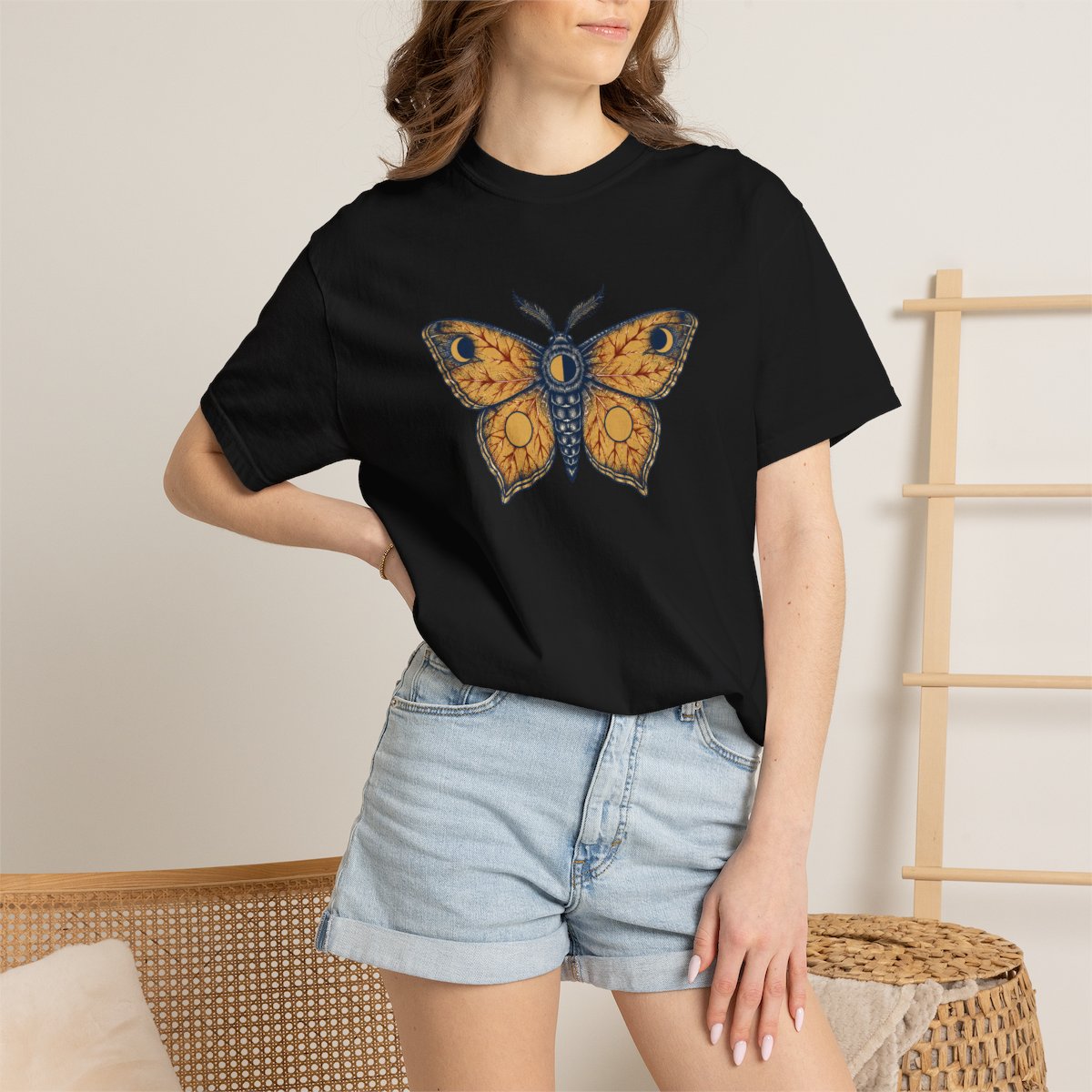 Celestial Moth tee in black, worn