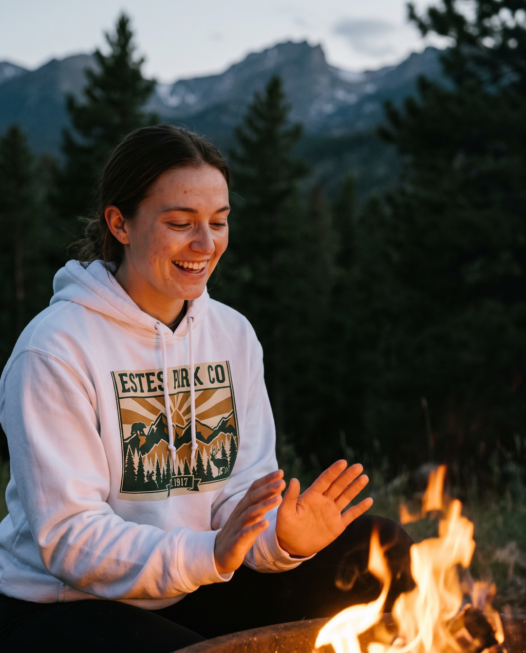 Estes Park CO Hidden Wildlife hoodie by a campfire