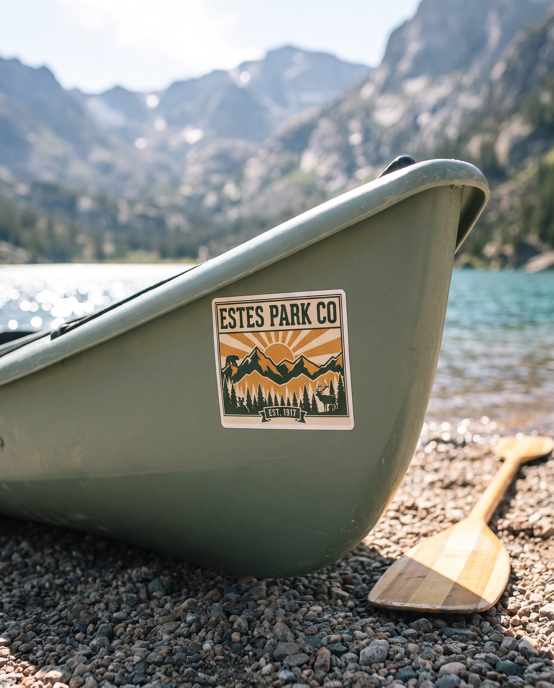 Estes Park CO hidden wildlife sticker on a canoe bow at an alpine lakeshore near Estes Park Colorado