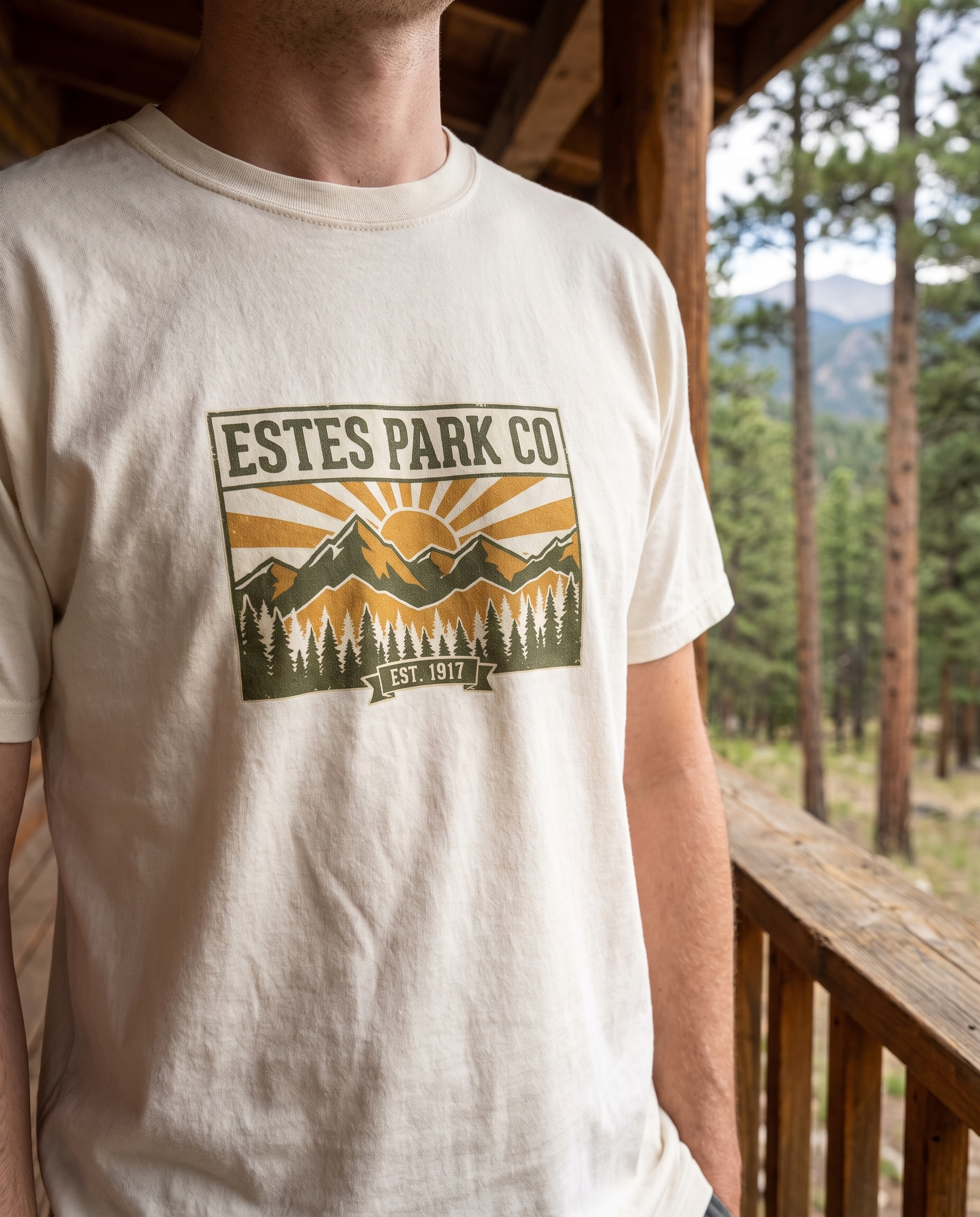 Ivory Estes Park CO vintage tee worn on a Colorado cabin porch