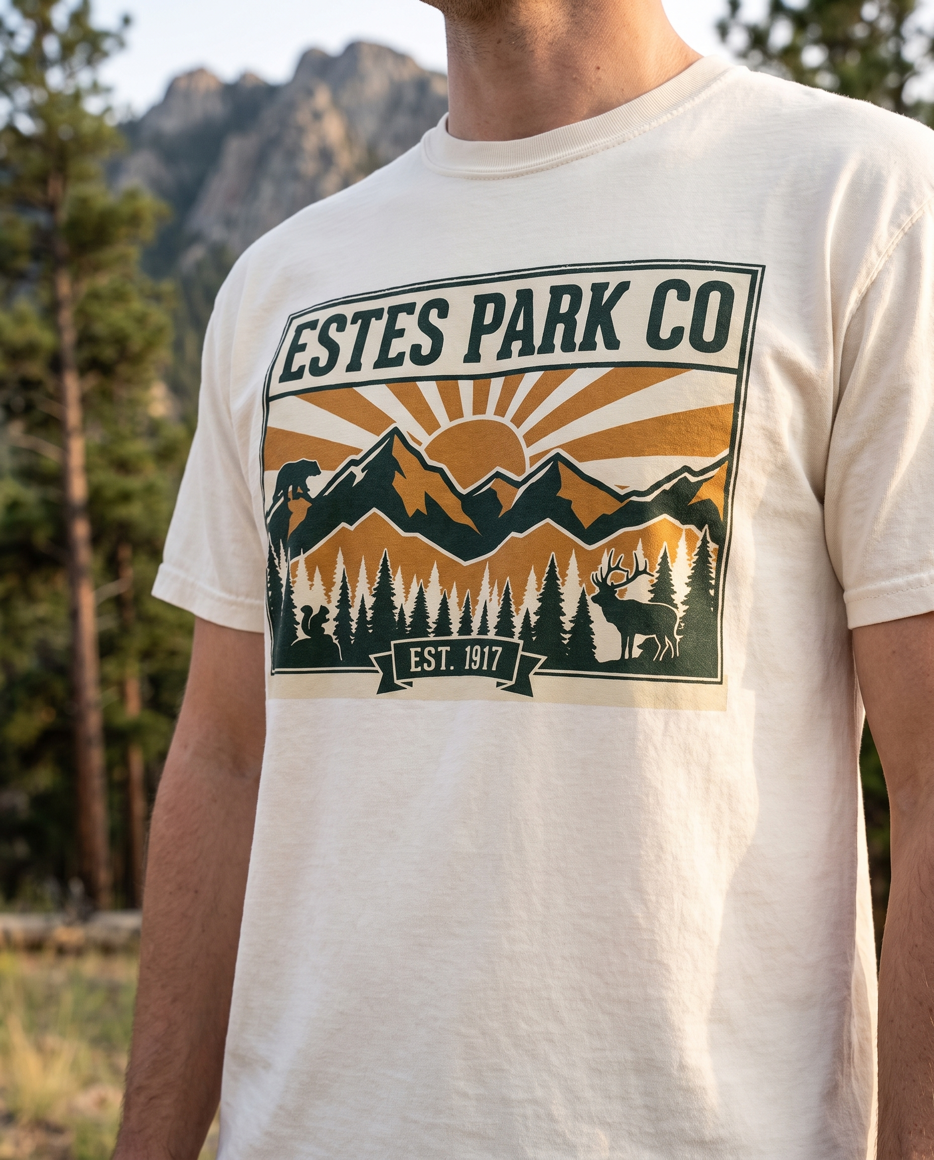 Ivory Estes Park CO hidden wildlife tee in forest green worn in Estes Park Colorado