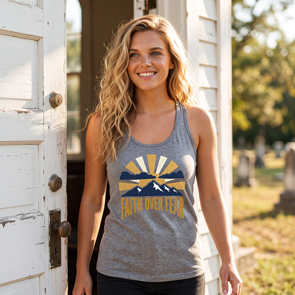 Faith Over Fear racerback tank in heather grey, worn by an approved model, mid lifestyle photograph
