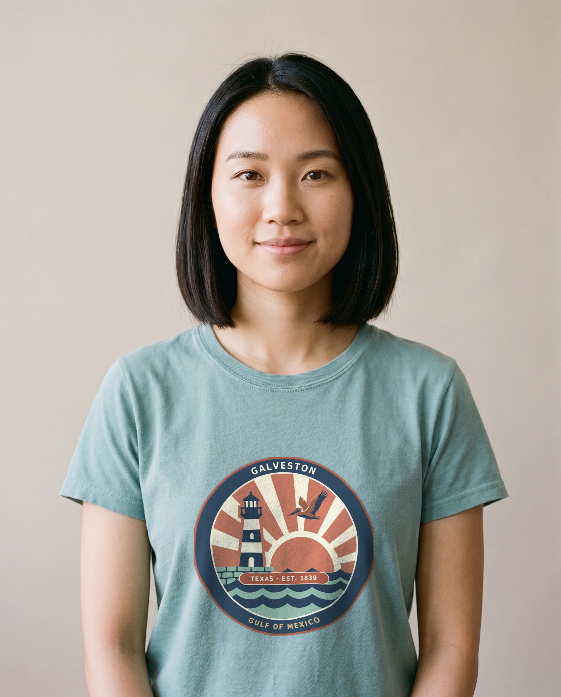 Woman wearing the Bay Galveston Texas vintage coastal badge tee, Comfort Colors 1717