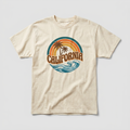 Retro 1970s California sunset graphic on a cream t-shirt