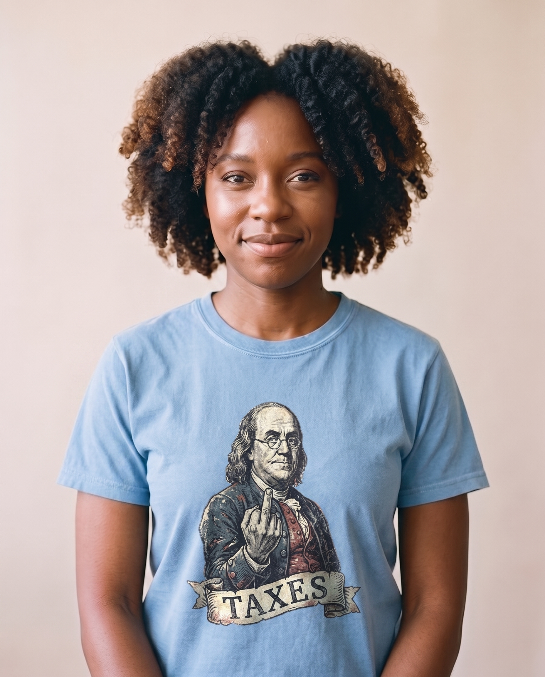 Woman wearing the Ben Franklin TAXES tee in Carolina Blue, vintage engraved Franklin print centered at mid-chest, matte screen print