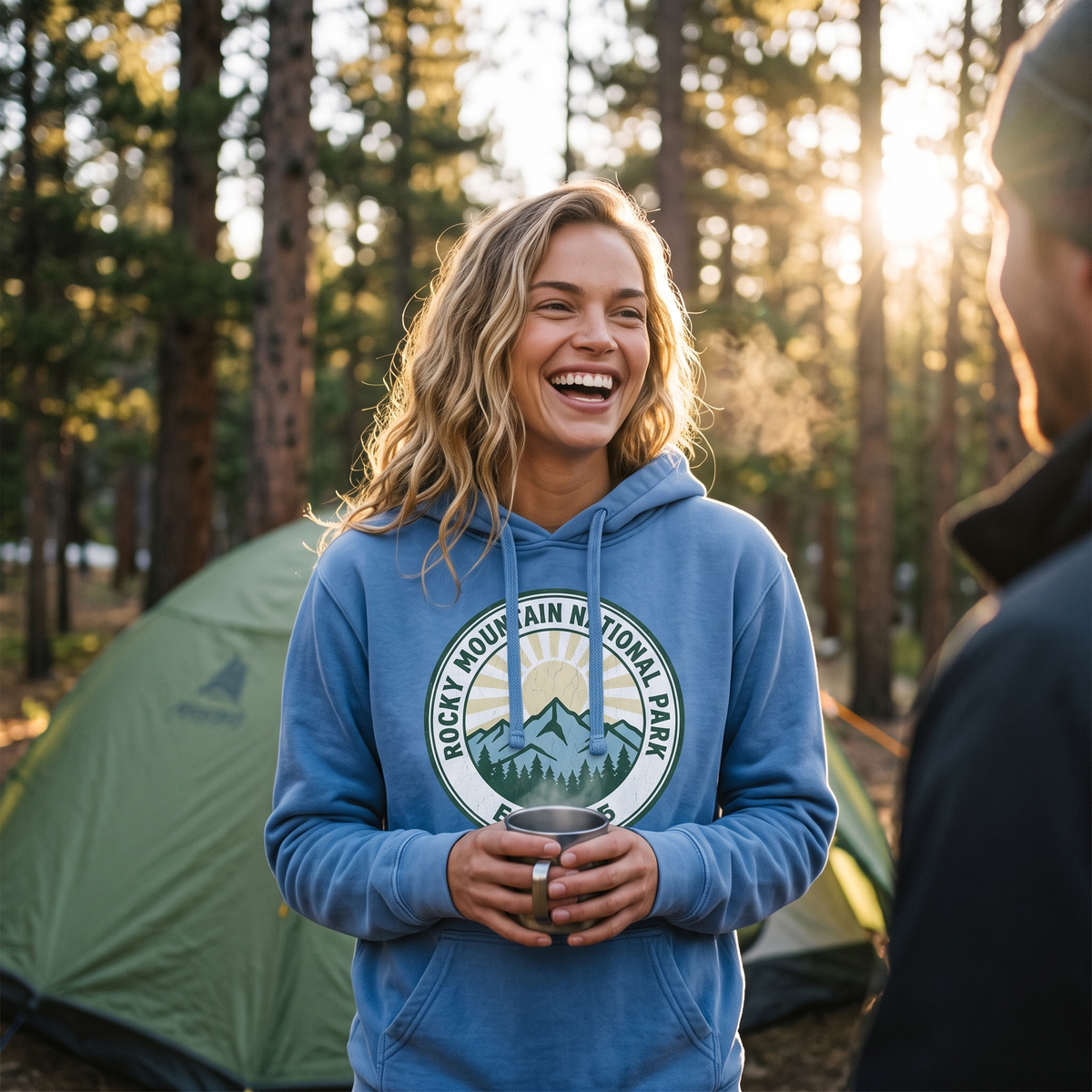 Rocky Mountain National Park hoodie in Flo Blue at a mountain campsite