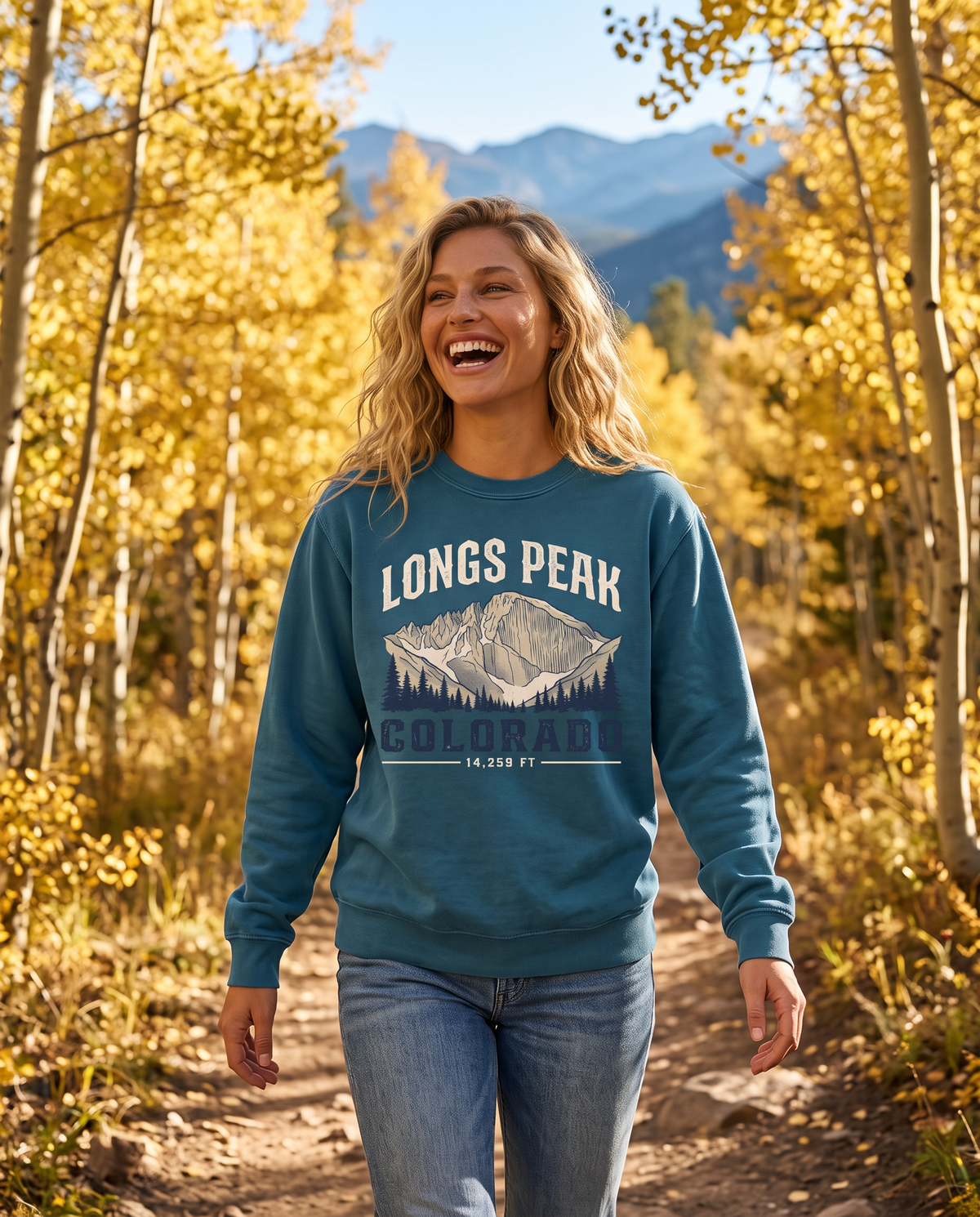 Longs Peak Colorado crewneck sweatshirt in Ocean on an aspen trail, lifestyle photograph