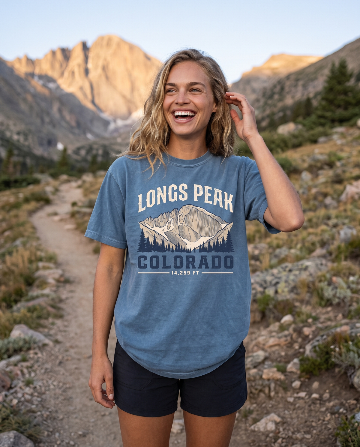Longs Peak Colorado tee in Blue Jean on a Rocky Mountain trail, lifestyle photograph