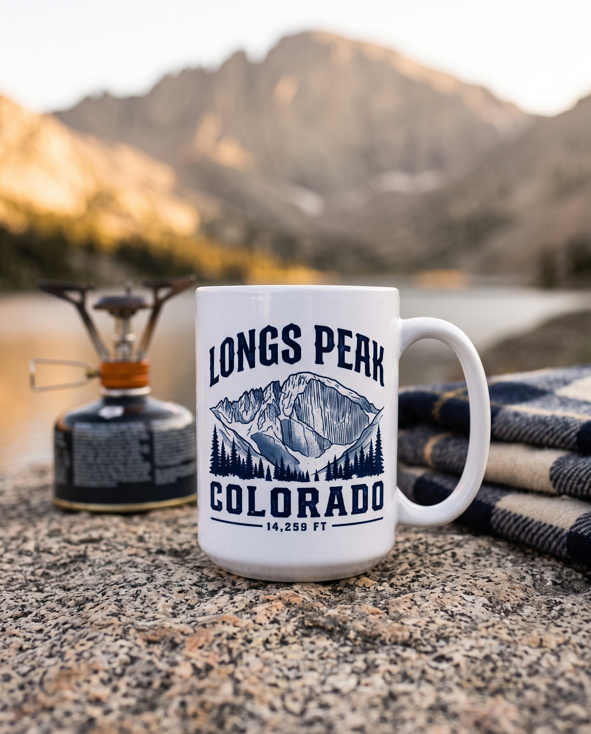 Longs Peak Colorado coffee mug at a mountain campsite at sunrise