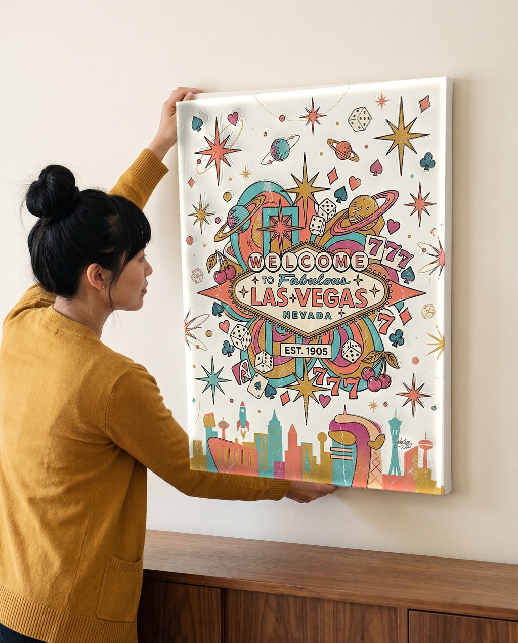 Woman leveling the retro casino canvas, showing its true 18 by 24 inch size