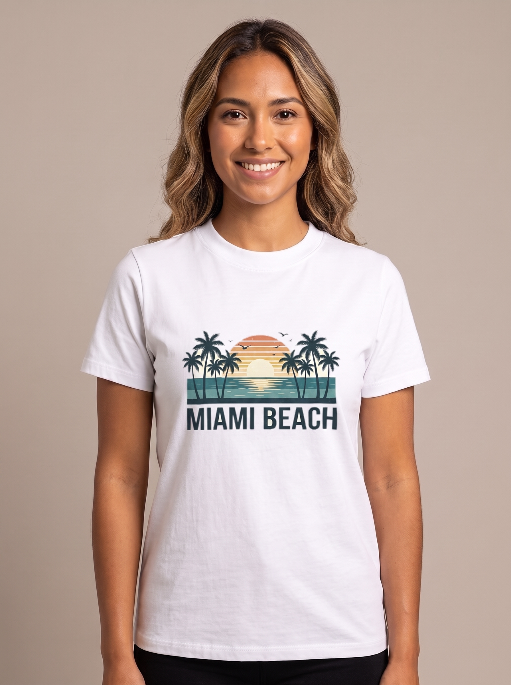 Woman wearing the Miami Beach retro tee in White, vintage teal sunset with palms and the MIAMI BEACH wordmark screen printed on the center chest
