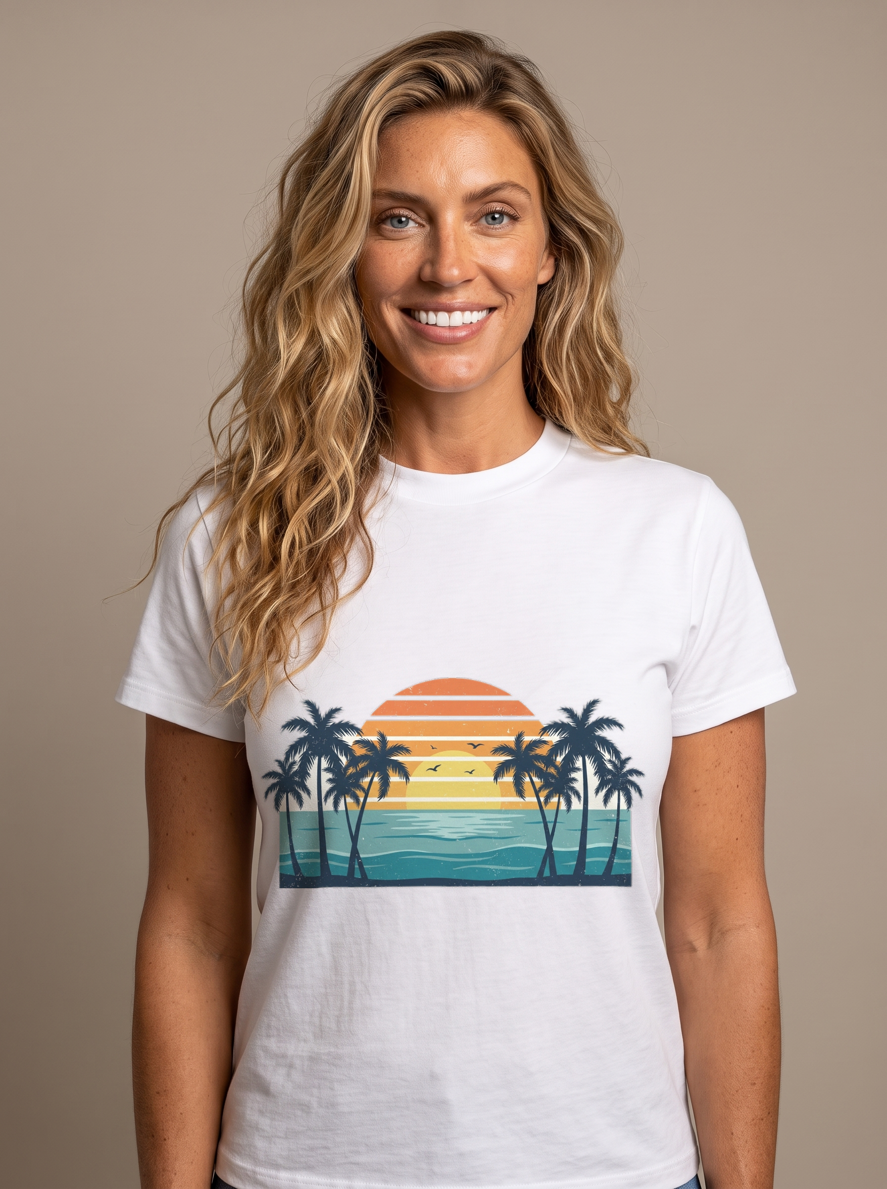 Woman wearing the Retro Beach Sunset tee in White, vintage palms and a striped sunset over the ocean centered on the chest