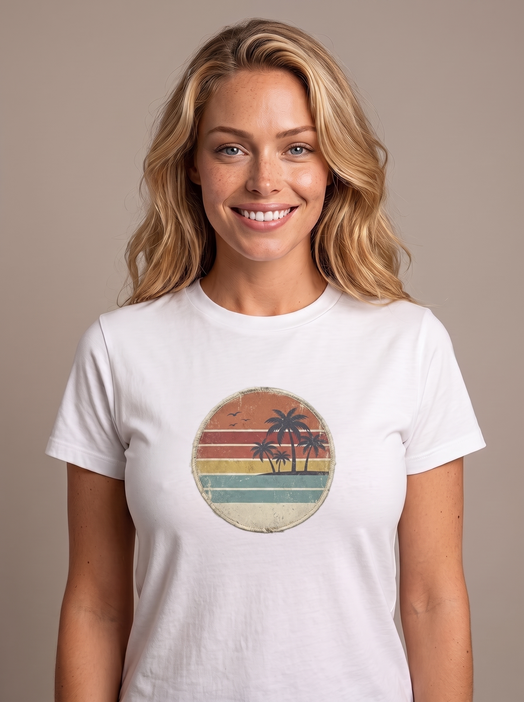Woman wearing the Retro Sunset Circle badge tee in White, vintage striped sunset circle with palms screen printed on the center chest
