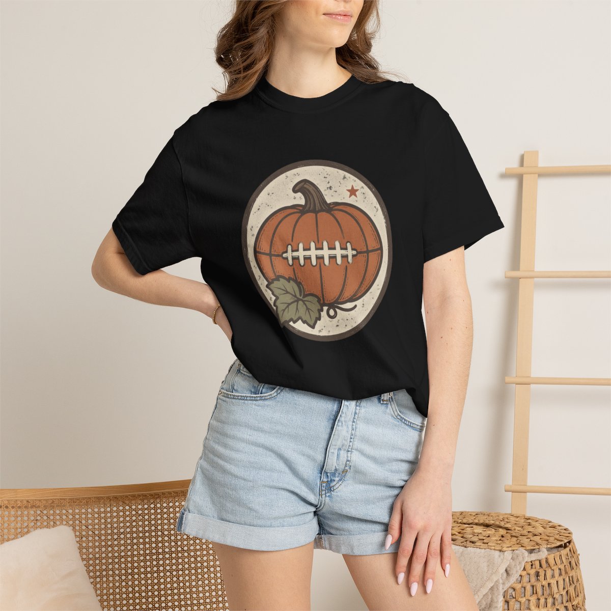 Pumpkin Football tee in black, worn