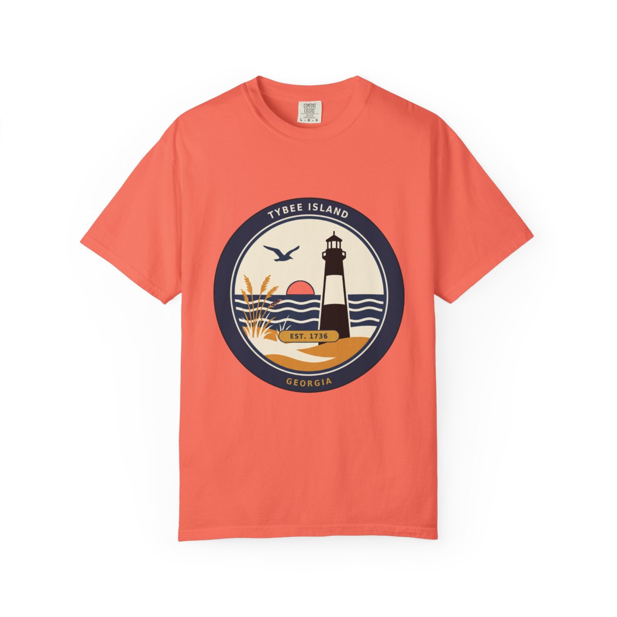 Tybee Island lighthouse badge tee in Bright Salmon, front product view with the full circular badge centered on the chest