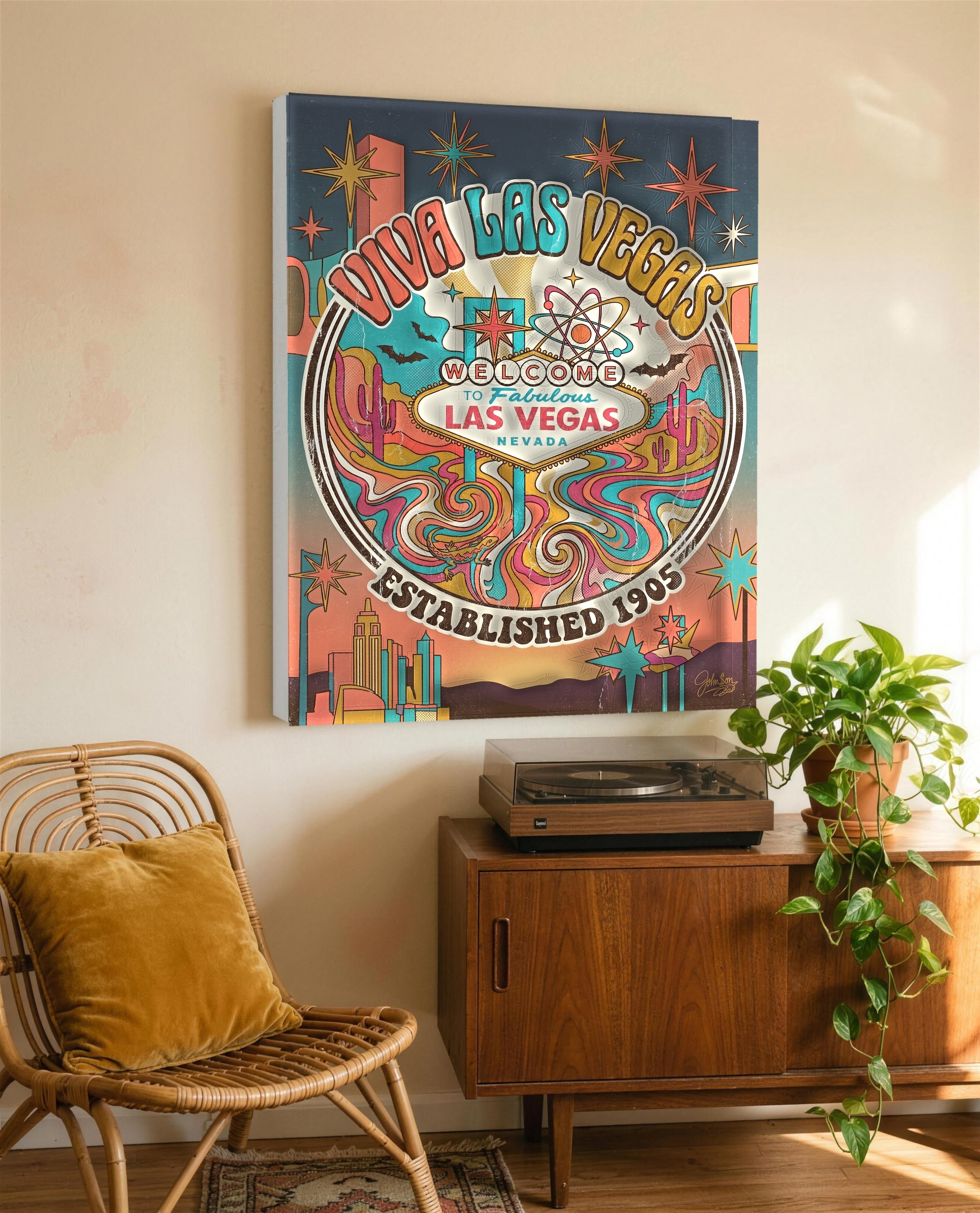 Viva Las Vegas retro canvas above a walnut sideboard with record player